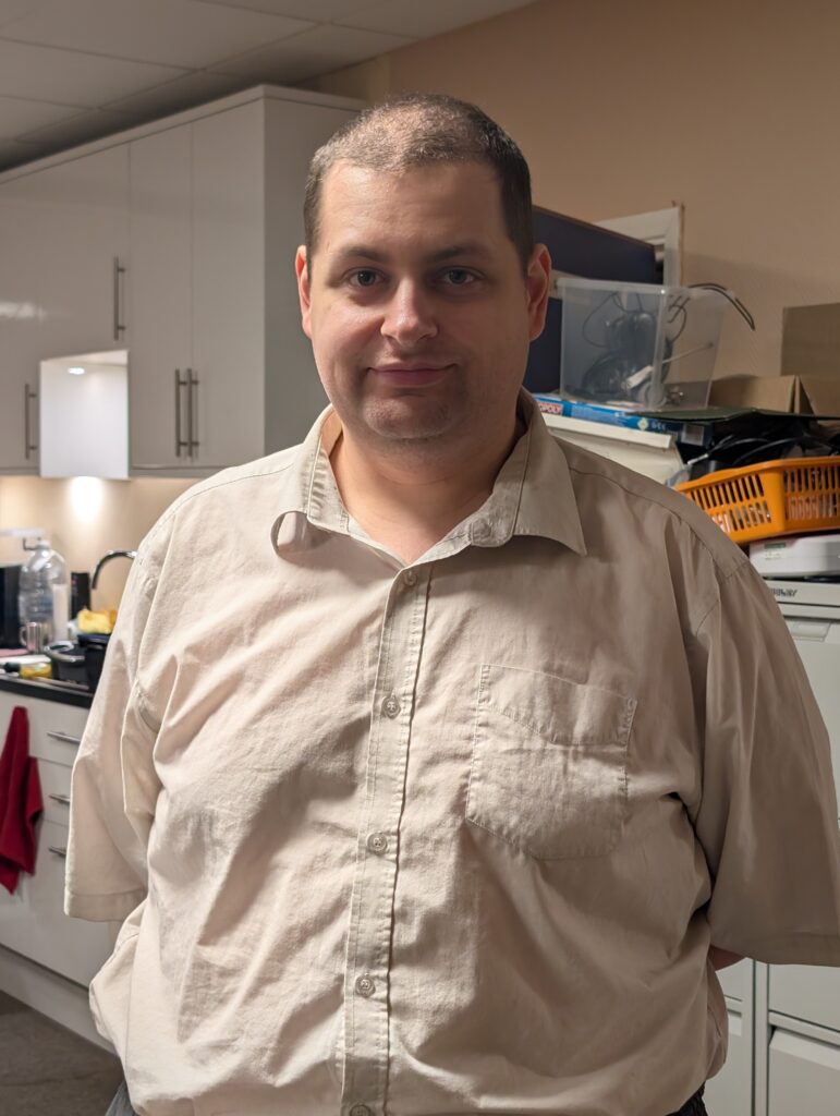 Malcolm Boakes, Shop Assistant and Technician at Redhill Shopmobility, providing expert advice and hands-on maintenance to keep our members mobile.